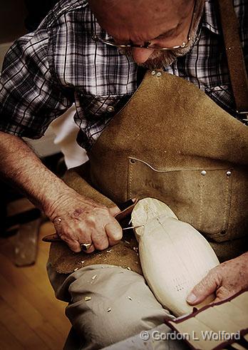 Wood Carver Carving_34765v2.jpg - Photographed at Smiths Falls, Ontario, Canada.